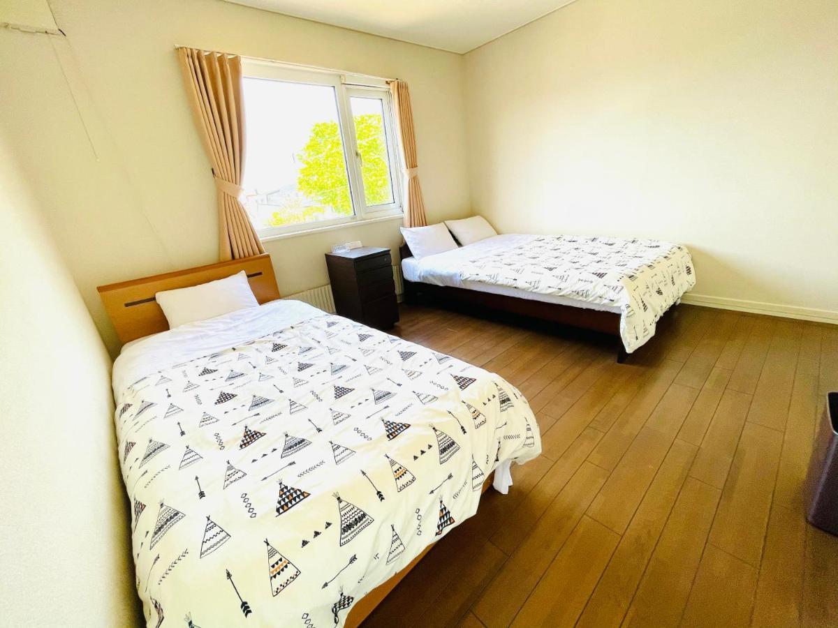 Chitose Guest House Oukaen Bagian luar foto