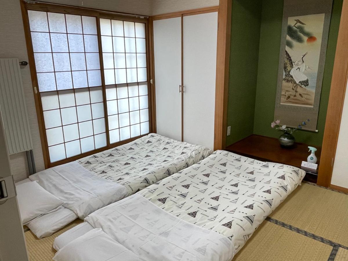 Chitose Guest House Oukaen Bagian luar foto