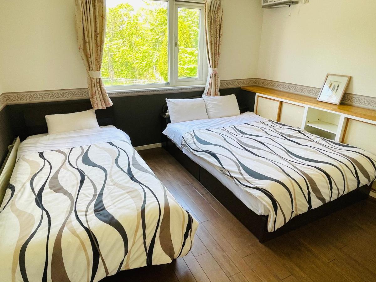 Chitose Guest House Oukaen Bagian luar foto