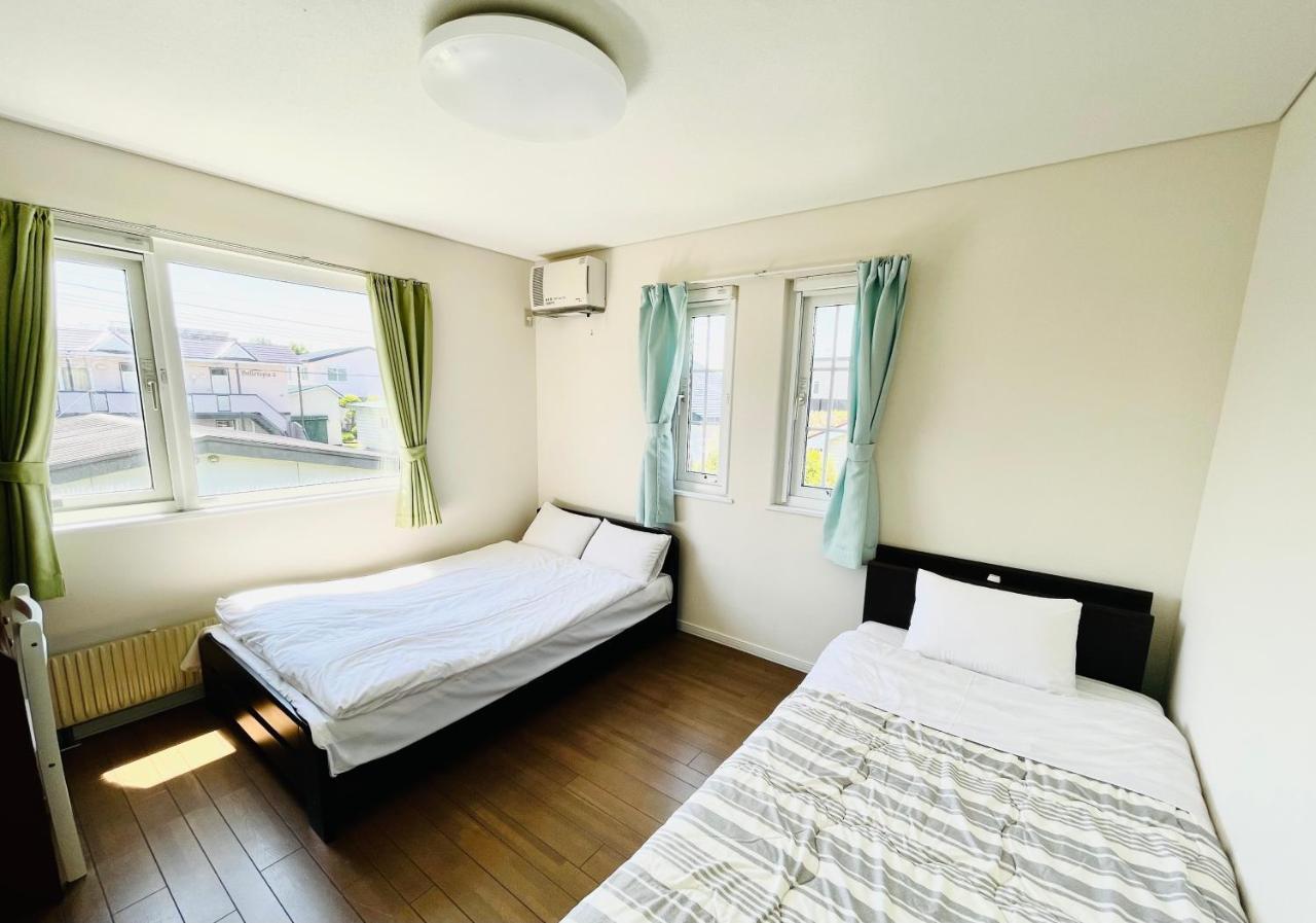 Chitose Guest House Oukaen Bagian luar foto