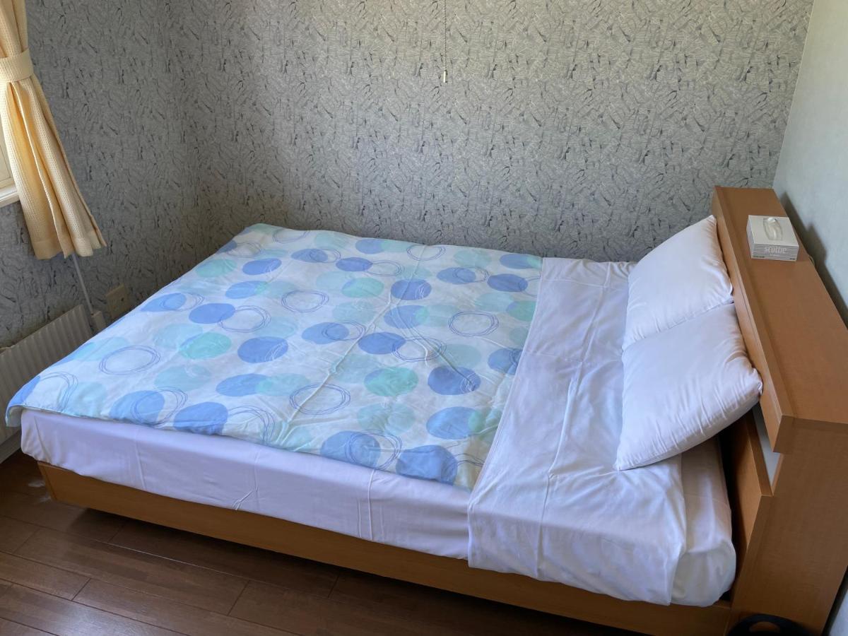 Chitose Guest House Oukaen Bagian luar foto
