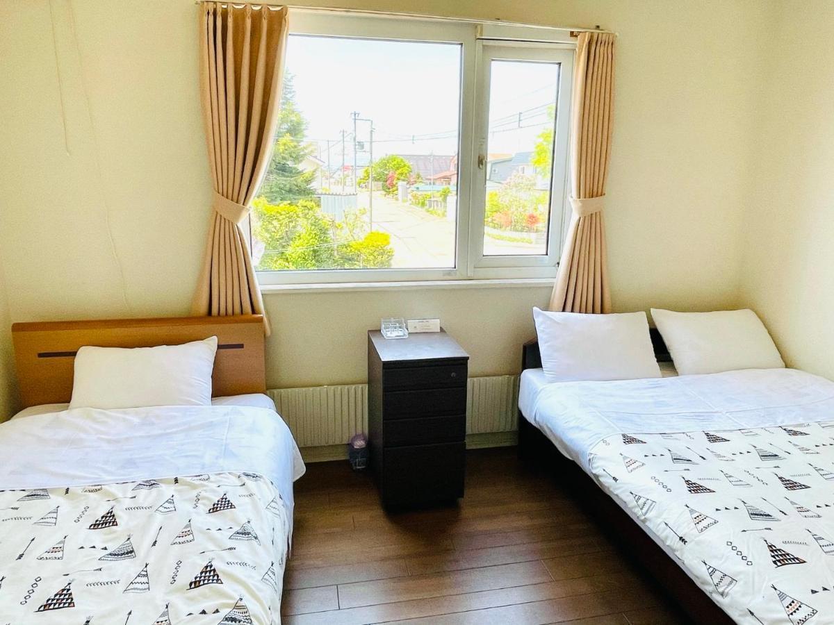 Chitose Guest House Oukaen Bagian luar foto