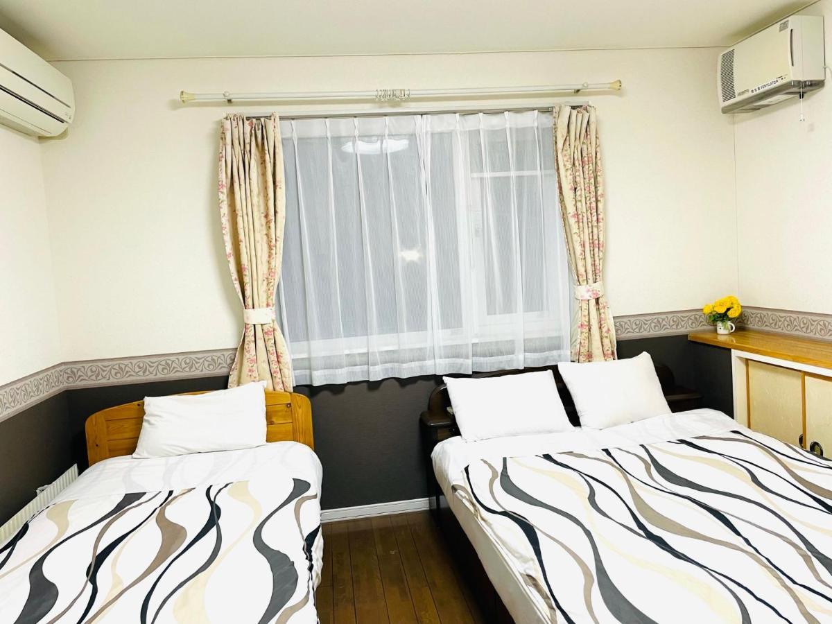 Chitose Guest House Oukaen Bagian luar foto
